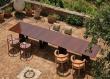 Naca Garden Table In Lava Stone