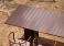 Naca Garden Table In Lava Stone